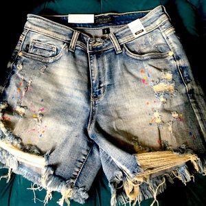 NWT, size Small destroyed cutoff denim shorts.